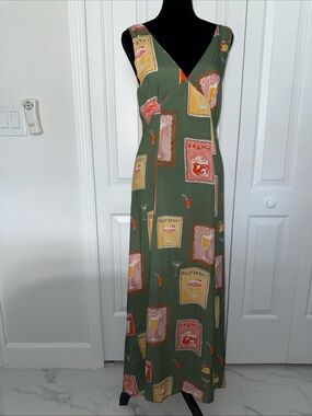 Sleeveless Olive Green Maxi Dress with cocktail print size small new with tags